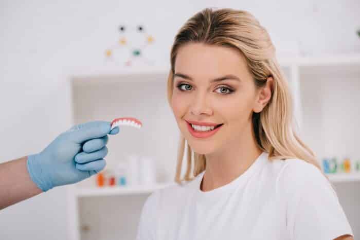 dental bonding vs veneers guide cosmetic dentist peachtree city