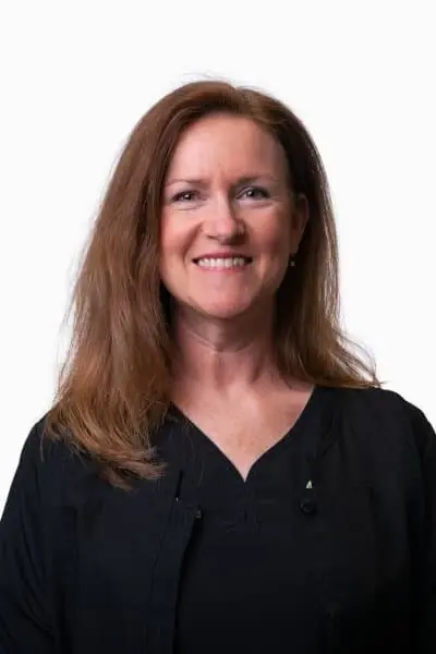 Diane M, dental professional at Peachtree City dental practice, smiling portrait.