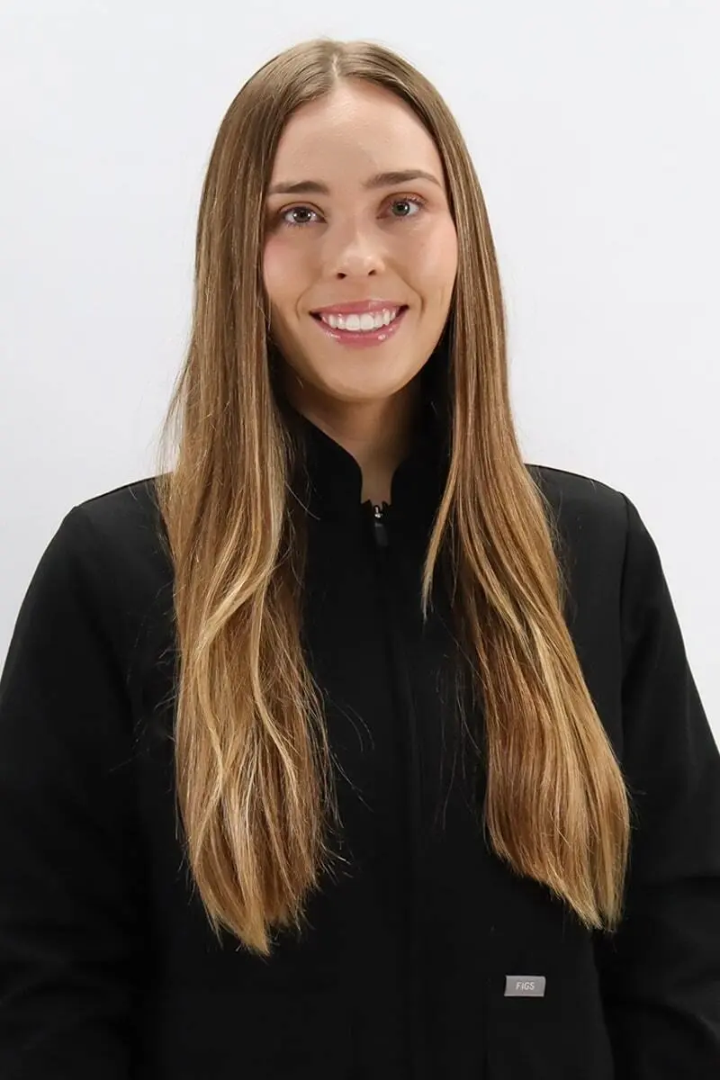 Dr. Morgan Rapp, dentist at Peachtree City dental practice, smiling professionally.