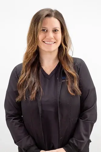 Samantha B., dental professional at Peachtree City dental practice, smiles in professional headshot.
